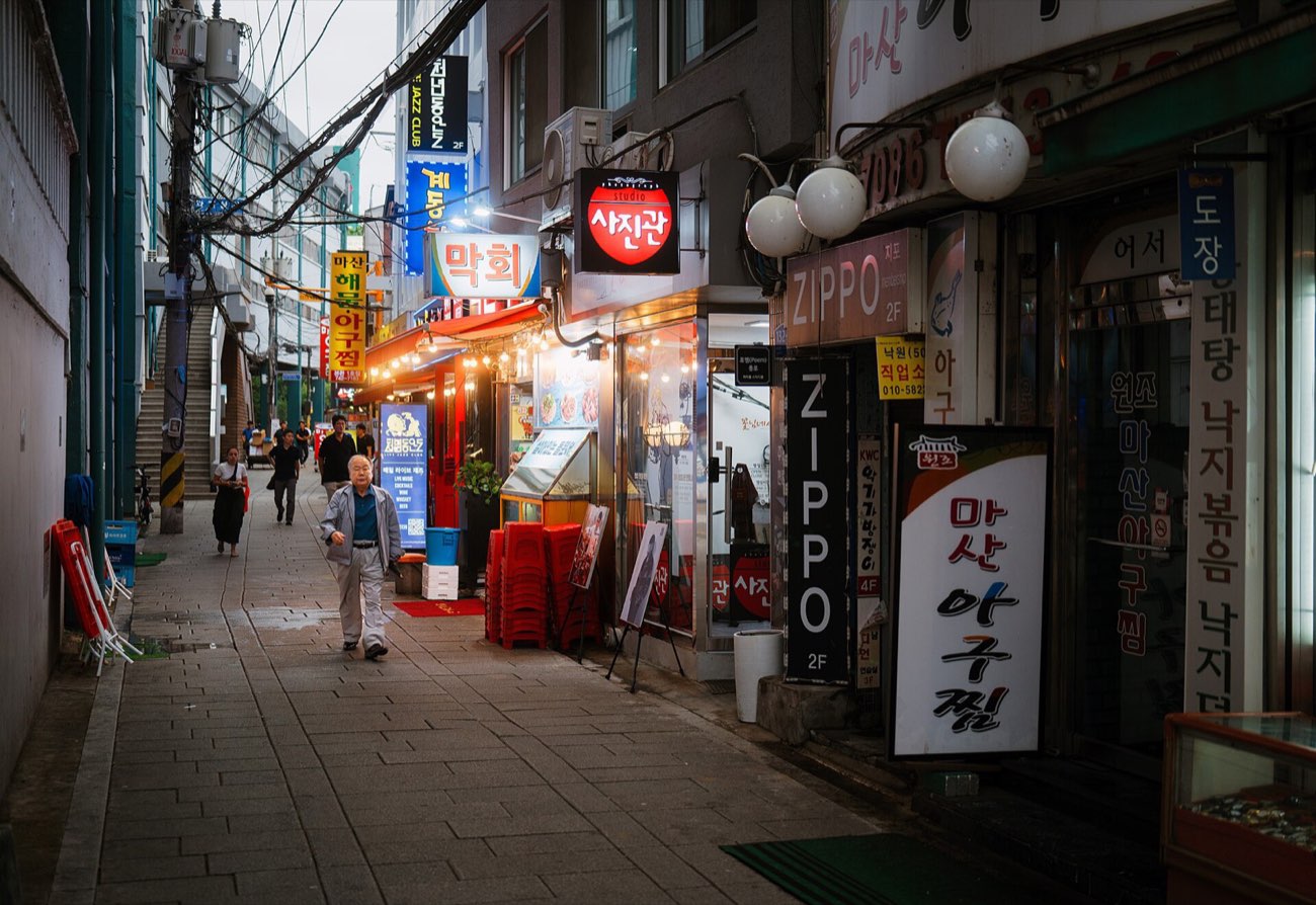Sign-lit shopping street in central Seoul